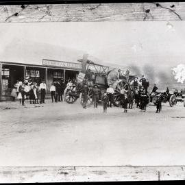 General store with crowd of people outside