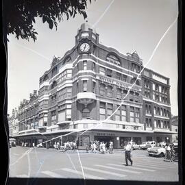 David Jones, street view of city building with clock, 1963