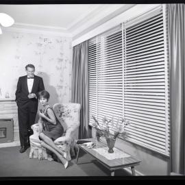 On location photo shoot, couple in living room, 1964