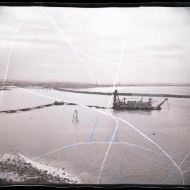 Dredging spoil gushing from pipe at Stockton, Newcastle Harbour, 1963
