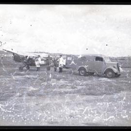 Loading small aircraft with packages from a Klosters van