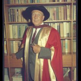Gentleman posing in academic robe