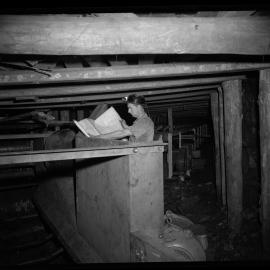 Bellambi Colliery, miner reading plans, 1961