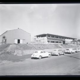 Industrial site with cars, Titan Manufacturing Co Pty Ltd, 1961