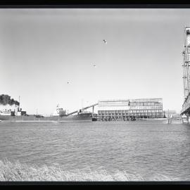 R W Miller's loading plant,  large ship 'Branxton', 1961