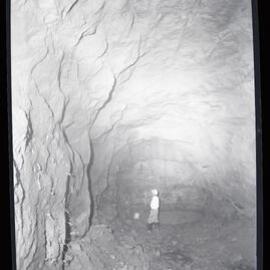 [Cave and man in hard hat], 1961