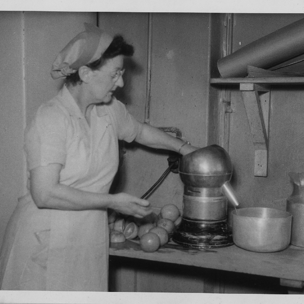 Female hospital staff juicing oranges, Royal Newcastle Hospital, Dietary Department, 1960s