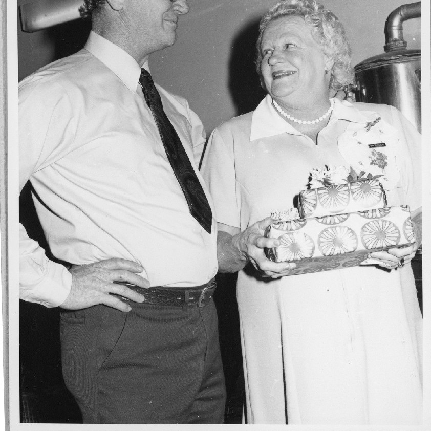 Mr. Edwards, left and Mrs. Summers, right at Mrs. Summer's retirement event, Royal Newcastle Hospital, Dietary Department, 1960s