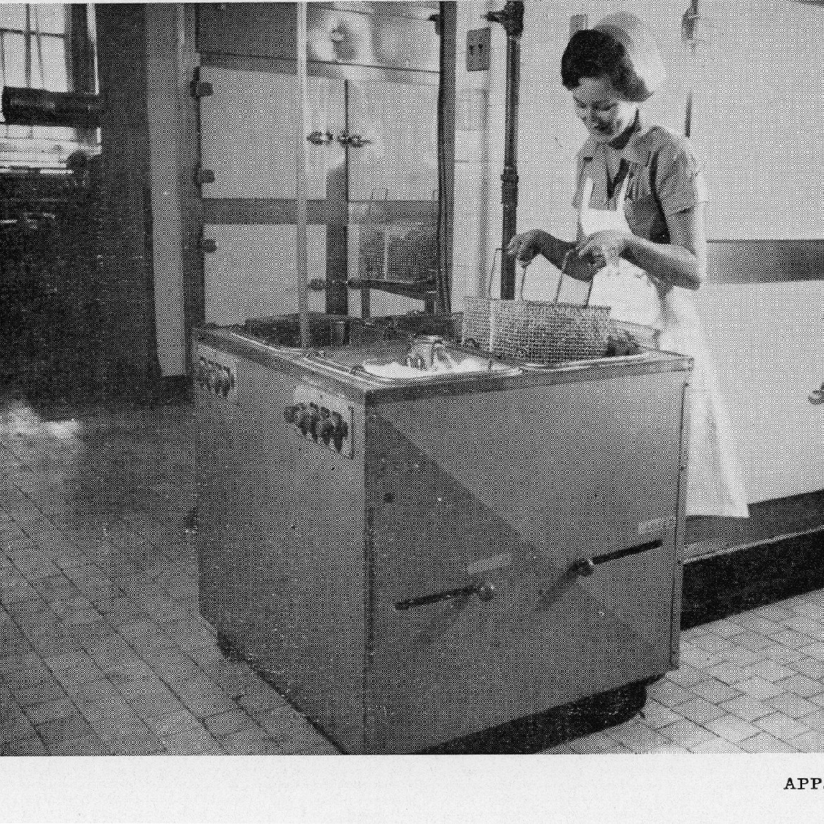 Hospital kitchen, female staff using deep-fryer, Royal Newcastle Hospital, Dietary Department, 1960s