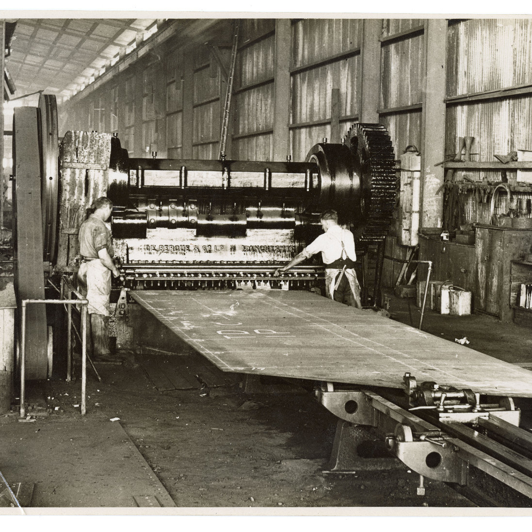 Men with Machine at Walsh Island Dockyard