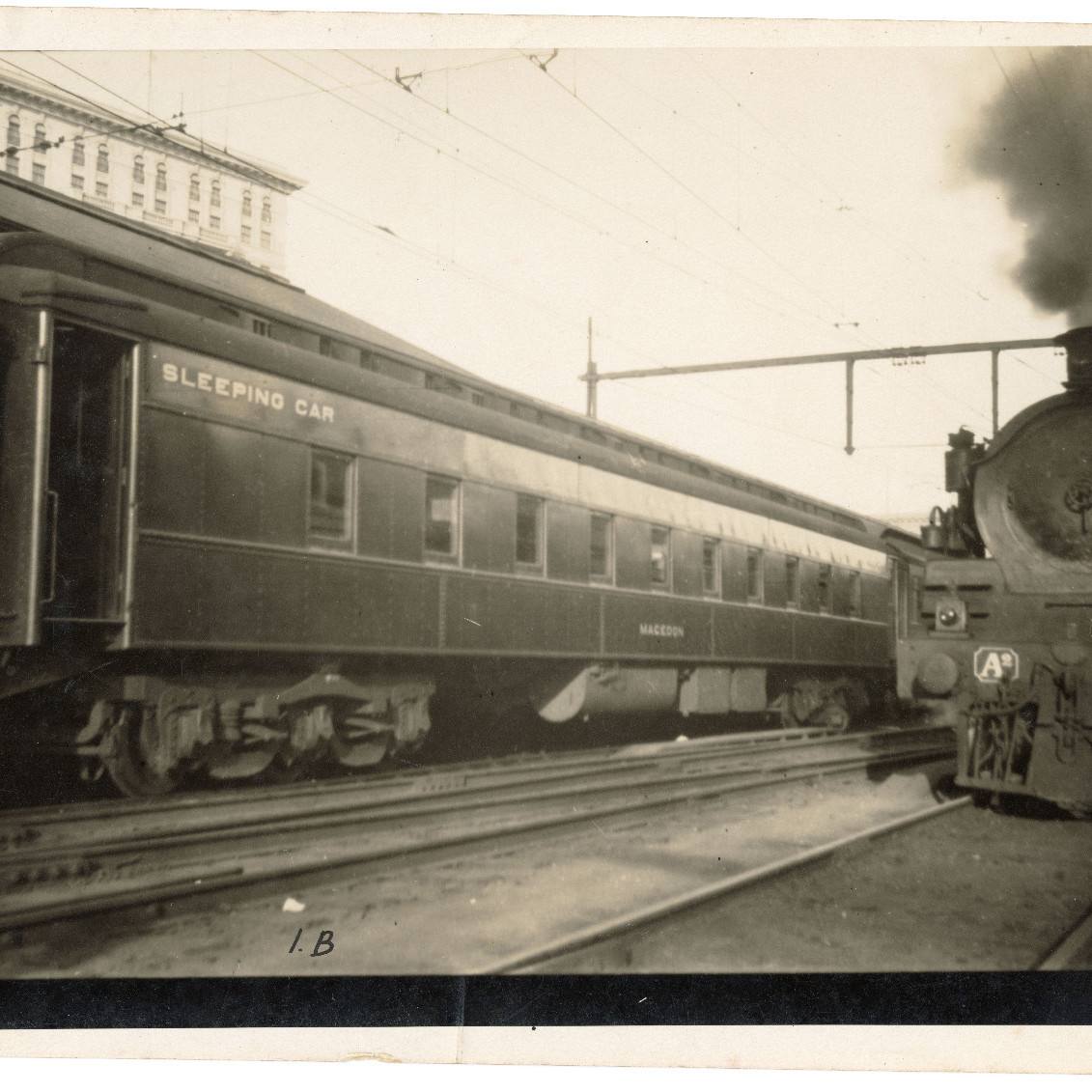 Sleeping Carriage at an unknown station (Possibly Victoria due to Victorian Railway A2 Class on Right)