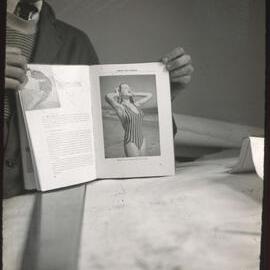 Unknown student with magazine, unknown location [1960s]