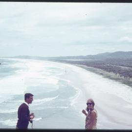 People at coast, unknown location [1960s]