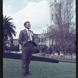 Douglas [unknown surname] standing in park, Auckland, New Zealand (1963)
