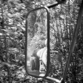 Rowley Wellard coming down the mountain - photograph of the reflection in the rear vision mirror