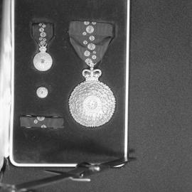 Order of Australia medal awarded to Athel D'Ombrain in 1975 and presented by the Queen at Canberra, September 3, 1977