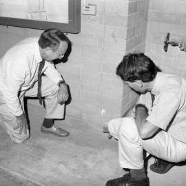 Professor Adrian Page with Professor Rob Melchers  inspecting earthquake damage, the University of Newcastle, Australia - 1992