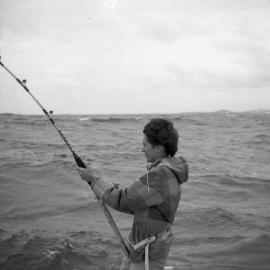 Dolly Dyer playing a Striped Bonito on light gear