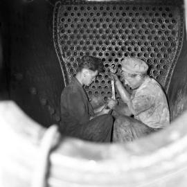 South Maitland Railways, men working on the boilers of engines, 1961