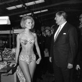 Osti clothing factory at Kurri - Mr. and Mrs. Fuller talking to one of the models