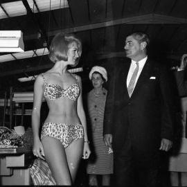 Osti clothing factory at Kurri - Mr. and Mrs. Fuller talking to one of the models