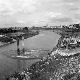 Pylons remaining during demolition old Belmore Bridge, Maitland, NSW, 1965