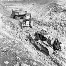 Tractors and truck, excavating for Balickera Canal, NSW, 1963