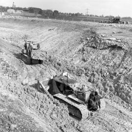 Two tractors, construction of Balickera Canal, NSW, 1963