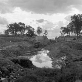 Boags cutting Balickera Canal to Williams River, August 1963