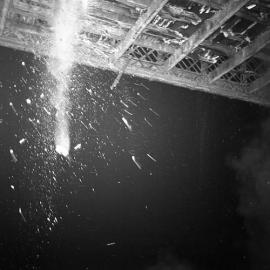 Debris from burning of old Belmore Bridge during demolition, Maitland, NSW, June 12, 1965