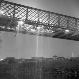 Burnt decking of old Belmore Bridge during demolition, Maitland, NSW, June 12, 1965