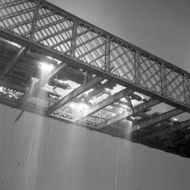 Decking of old Belmore Bridge being burnt during demolition, Maitland, NSW,  June 12, 1965