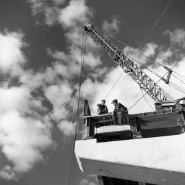 Workmen on pier of new Belmore Bridge, Maitland, NSW, June 1963