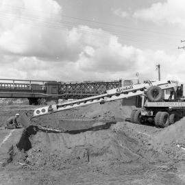 Digging underway for construction of new Belmore Bridge, Maitland, NSW, 1961