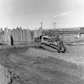 Bulldozing of ground for new Belmore Bridge, Maitland, NSW, 1961