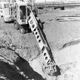 Digging in progress for construction of new Belmore Bridge, Maitland, 1961