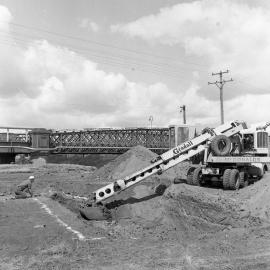 Digging machine, construction of new Belmore Bridge, Maitland, NSW, 1961