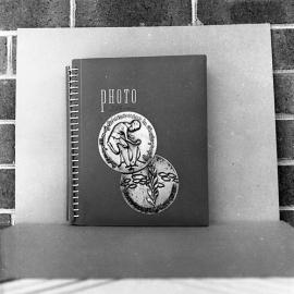 Cover of album showing Australasian Photography Review medal design