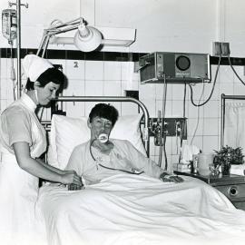 A nurse tends to a patient in the intensive care unit, Royal Newcastle Hospital, Newcastle, NSW, [late 1960's]