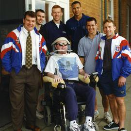 Unidentified people, including three Newcastle Knights [Matthew Johns in grey shirt], celebrating National Healthy Bones Week, Royal Newcastle Hospital, 1996