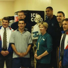 Unidentified people [Matthew Johns in grey shirt] celebrating National Healthy Bones Week, Royal Newcastle Hospital, 1996