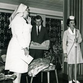 Presentation involving the "Pink Ladies", volunteers, Royal Newcastle Hospital, Newcastle, NSW