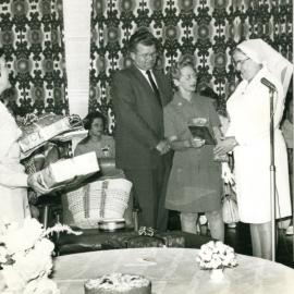 Presentation involving the "Pink Ladies", volunteers, Royal Newcastle Hospital, Newcastle, NSW