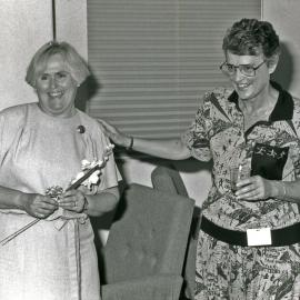 [Faye Woolley and] Deirdre Anderson, right, giving and receiving a gift, Royal Newcastle Hospital, Newcastle, NSW