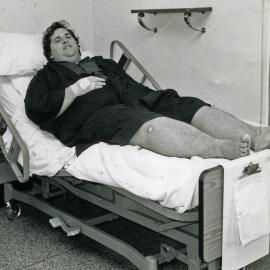 A patient on an electric hospital bed, Royal Newcastle Hospital, Newcastle, NSW