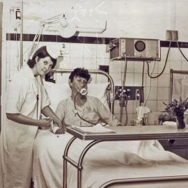 Annette Bossley attends to a patient in the intensive care ward, Royal Newcastle Hospital, Newcastle, NSW, [late 1960s]