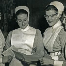 Nursing students discussing the final examination, Royal Newcastle Hospital, Newcastle, NSW, 1960