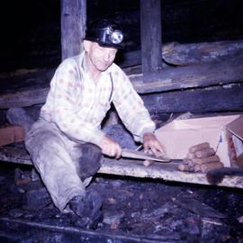 Jack Prosser - rolling dollies for steaming in shot firing at Northern (Rhondda) Colliery, NSW, Australia, c. mid 1960s, by Barry Howard