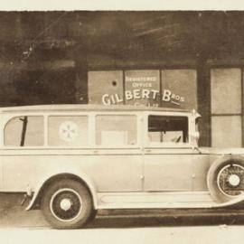 Early ambulance built in Newcastle, outside Gilbert Bros, NSW, Australia [1929]
