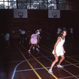 Ladies playing basketball